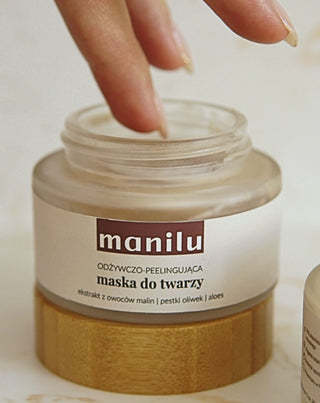 Maska do twarzy odżywczo-peelingująca z pestkami z oliwek i olejem makadamia Manilu